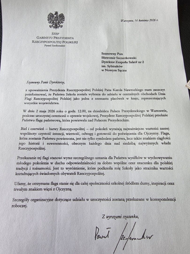 Formal Polish government letter with an eagle crest, dated Warsaw 16 April 2026, addressed to a school director regarding flag day ceremonies.